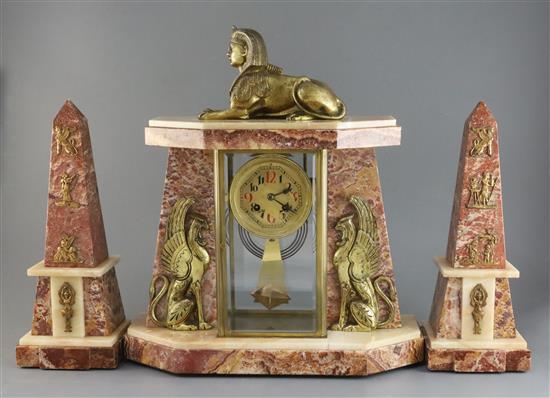 An early 20th century French ormolu and marble Egyptian revival clock garniture, 14in.